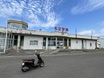 �當��